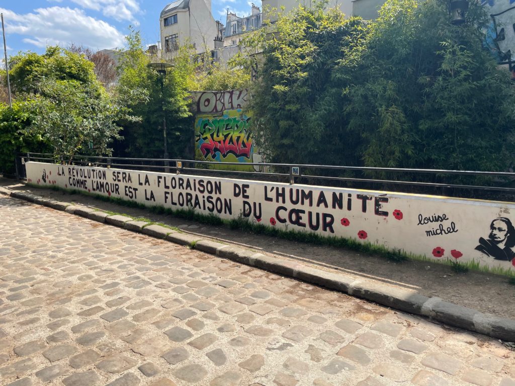 citation de Louise Michel, rue des Thermopyles, Paris 14 : "La révolution sera la floraison de l'humanité comme l'amour est la floraison du coeur